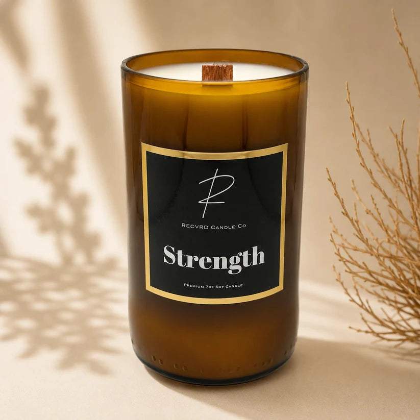 STRENGTH Beer Bottle Candle · Amber Driftwood