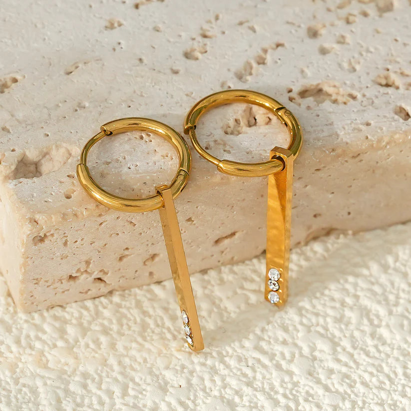 MAYLA: Gold Hoops with a Minimalist Charm featuring a Trio of Zirconia Gemstones