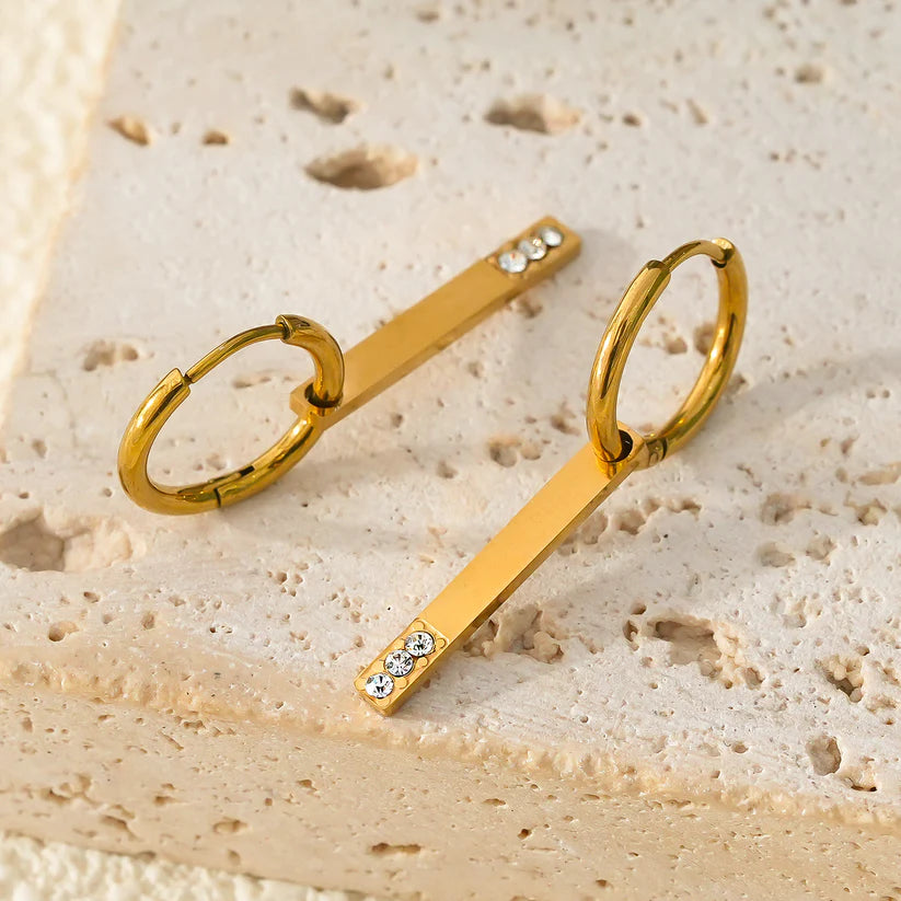 MAYLA: Gold Hoops with a Minimalist Charm featuring a Trio of Zirconia Gemstones
