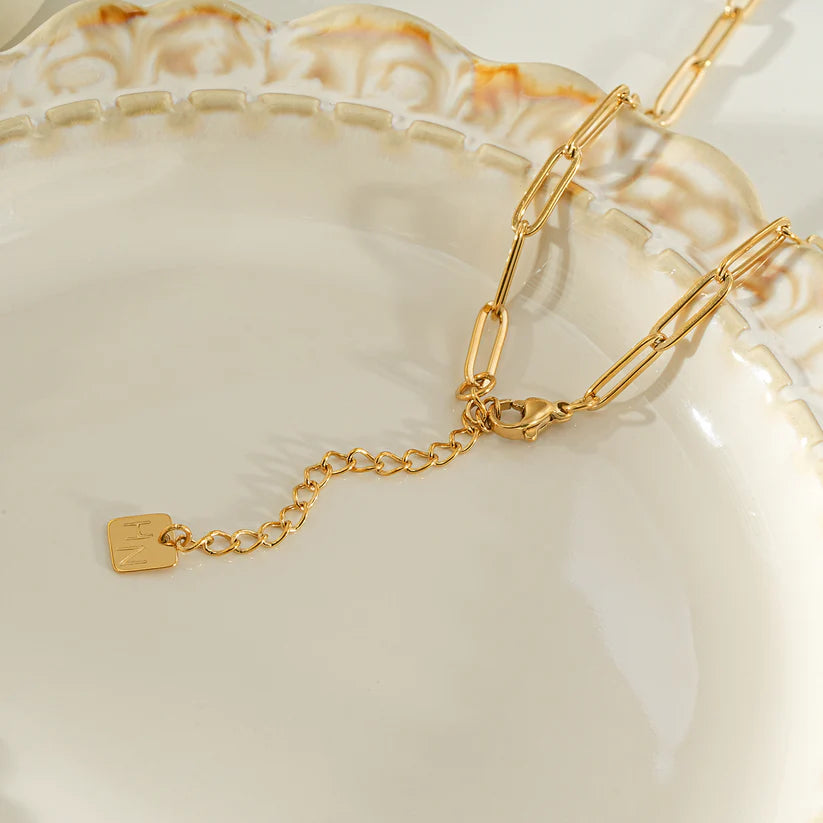 HEART WHITE Gold: Paper Clip Chain Anchoring an Enameled White Heart Charm